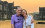 Travelers Mike and Lindsay Lanaux during sunrise at Angkor Wat, Cambodia.