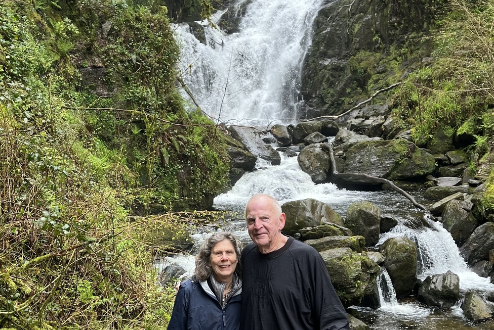 Travelers Sheila Morse and husband Dick Smith at Killarney National Park's Torc Waterfall, Ireland.