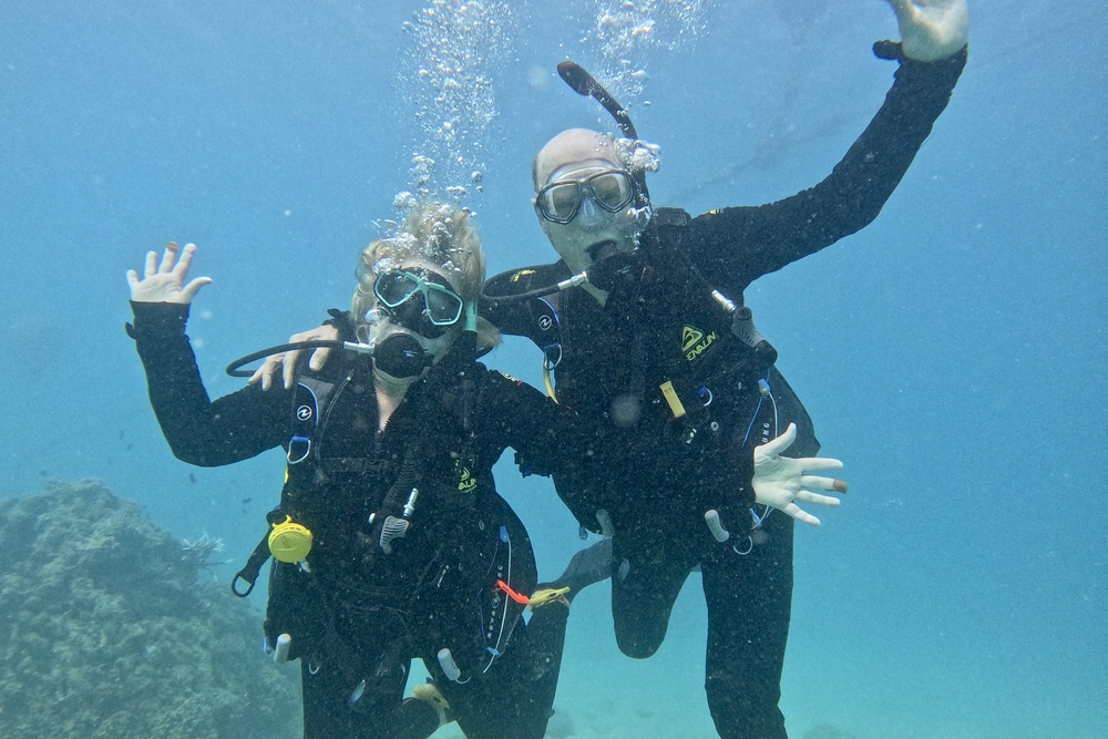 Travelers Brad and Laura Marion diving at Lizard Island, on the Great Barrier Reef, Australia.