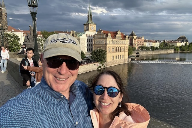 Travelers Ian and Suzy Crabb on the Charles Bridge in Prague, Czech Republic.