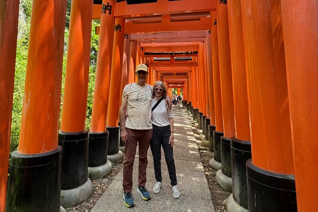 Travelers Barbara and Robert Fierman at Senbon Torii in Kyoto, Japan.