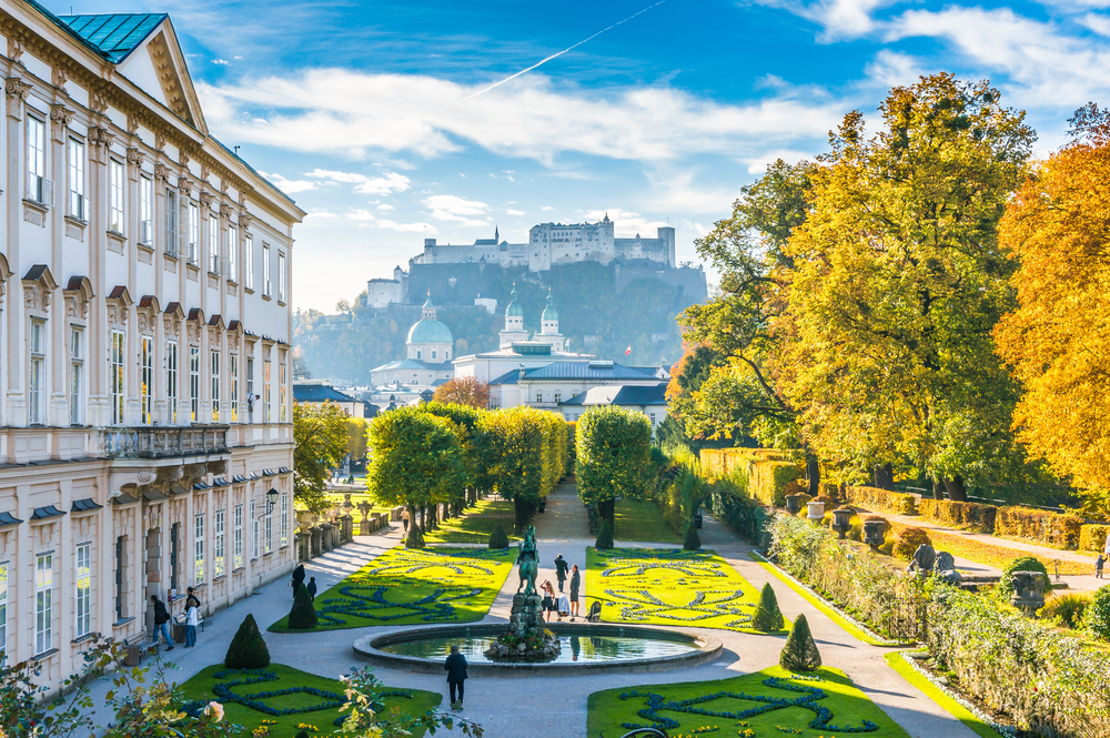 Mirabell Gardens with the old historic Fortress Hohensalzburg in the background in Salzburg, Austria.