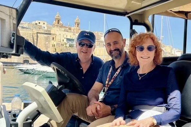 Travelers Nancy Mazarin and her husband, Guy, with their guide Stephen in Malta.