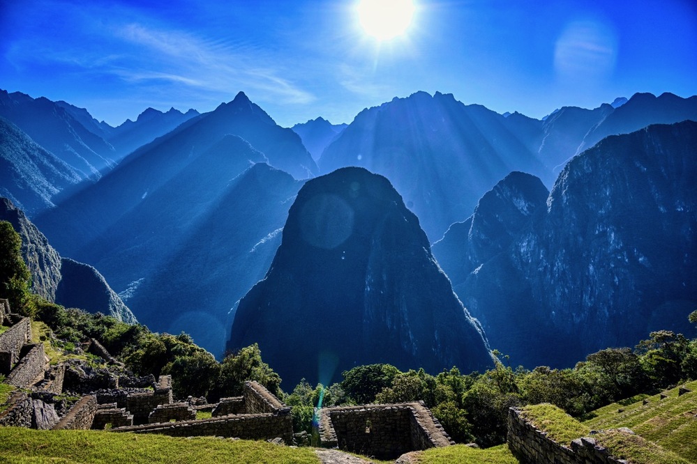 Sun rise over the mountains overlooking Machu Picchu, Peru.