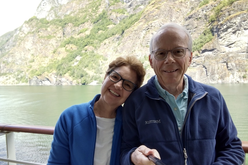 Travelers Christine Young and James Voris taking a selfie on their cruise departing Flam, Norway.