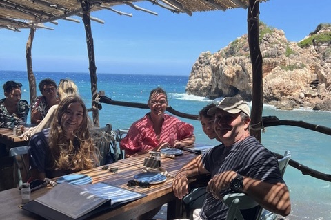 Elizabeth Crawford and her family at a waterfront restaurant featured in The Night Manager mini-series in Mallorca, Spain.
