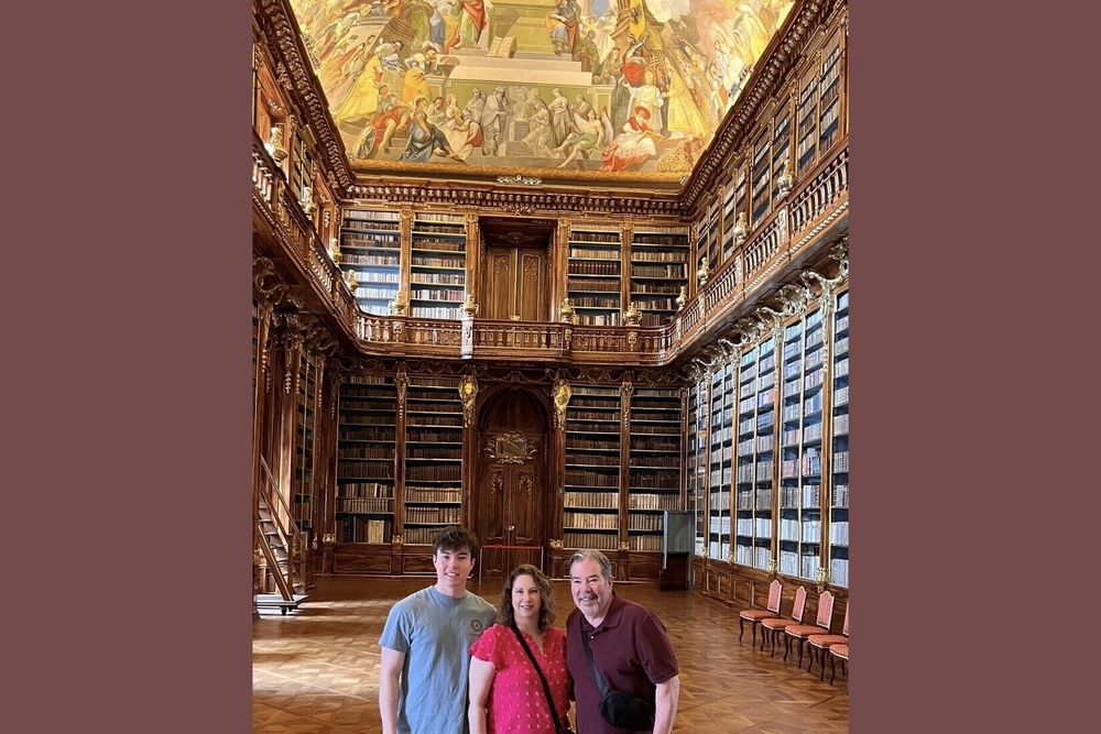 Michelle Price and her family in the Strahov Monastery's library, Prague, Czechia.