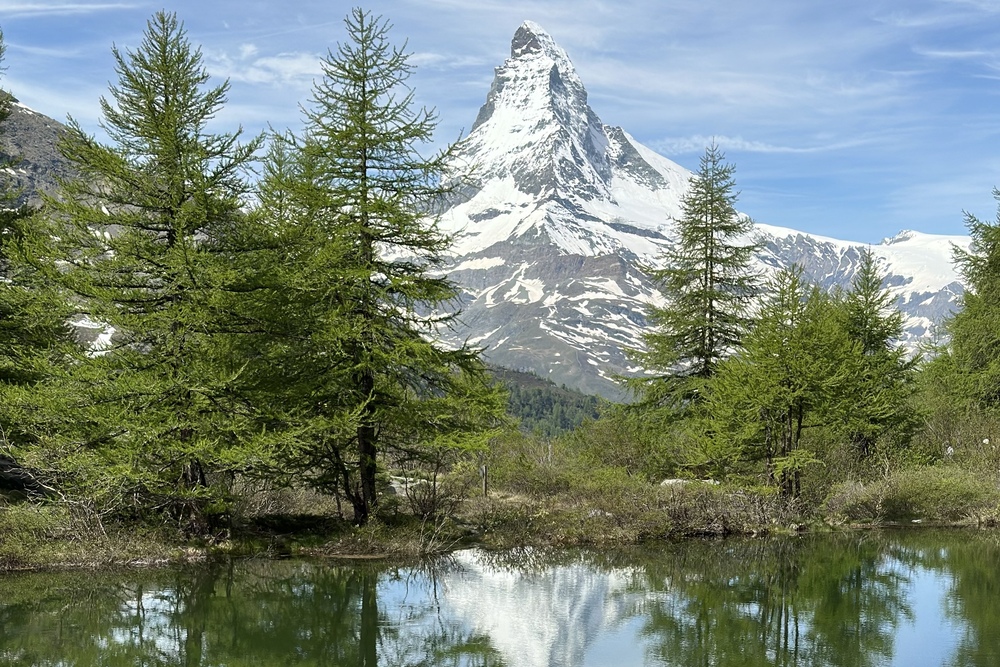 An alpine lake beneath the Matterhorn on the Five Lakes Trail in Switzerland.