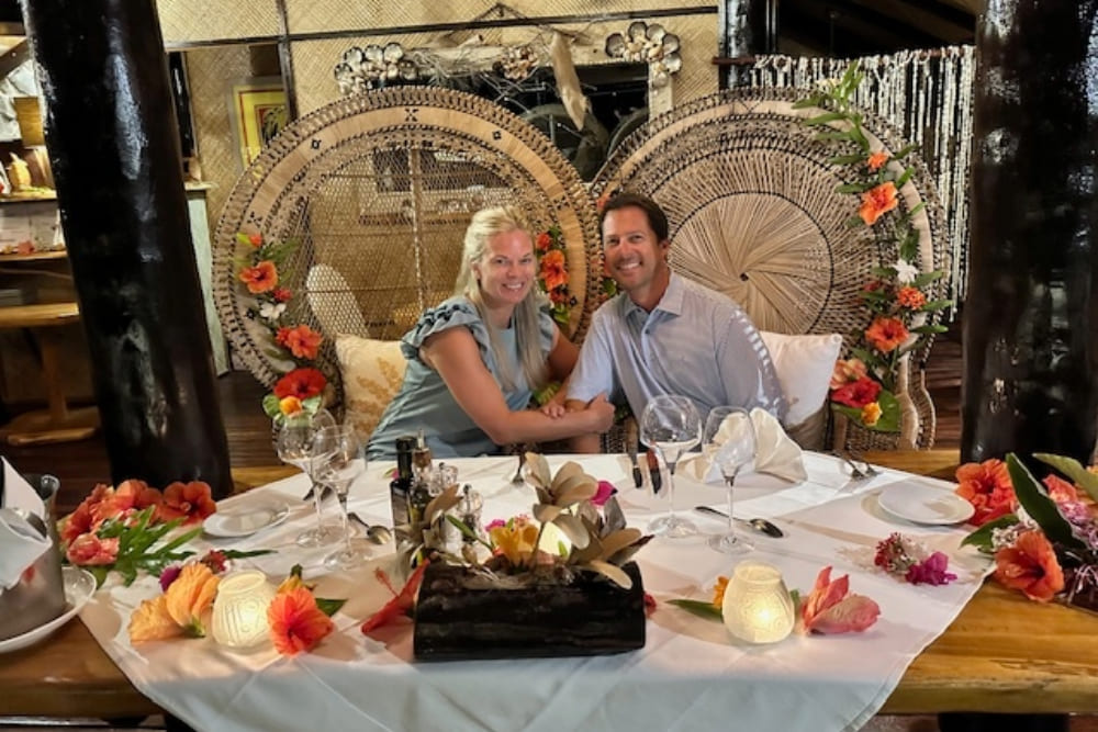 Jason and Shelly Smith celebrating their anniversary with a dinner in French Polynesia.