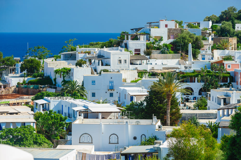 View of Panarea island with white houses, Aeolian islands, Sicily, Italy.