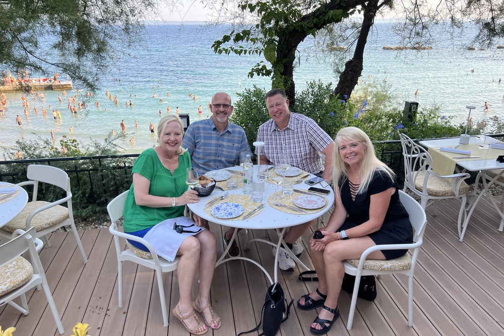 Travelers Molly Whisenant, Rance Raney, Thad Whisenant, and Leah Raney dining at Dvor restaurant in Split, Croatia.