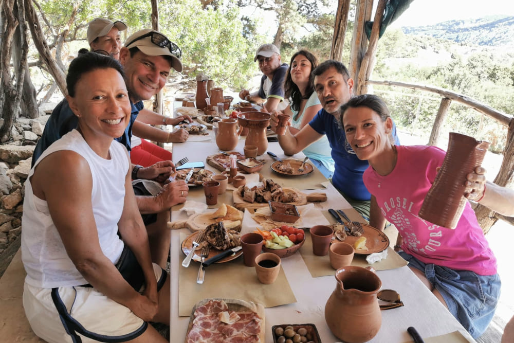 Gregory and Nancy Yurkoski, and their guide melina having dinner in Sardinia, Italy.