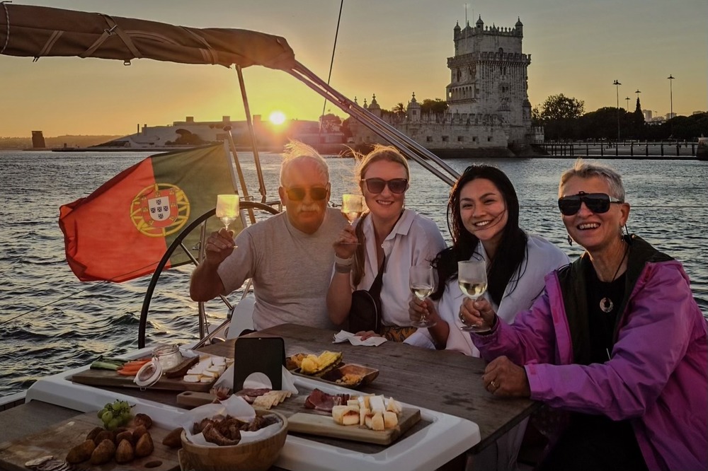 Mary Lou Voytko and family on a private sunset cruise in Lisbon, Portugal.