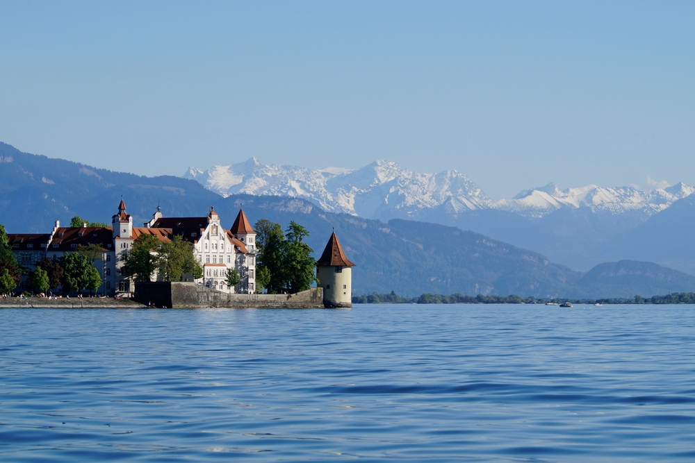 The island of Lindau on lake Constance with the snowy Swiss Alps in the background, Germany.