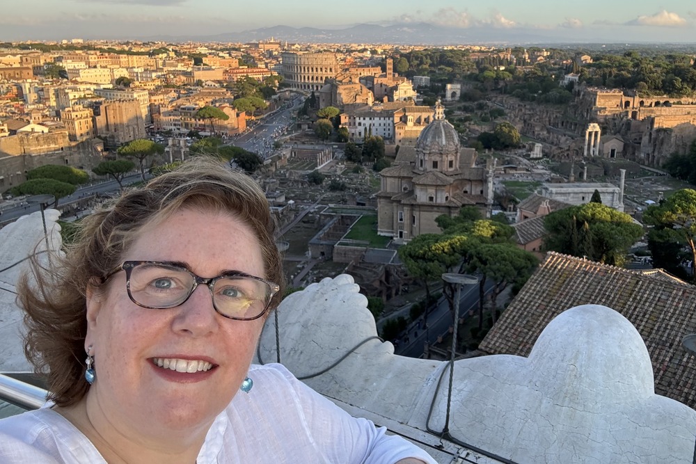 Wendy Perrin at the top of Vittorio Emmanuel monument in Rome, Italy.