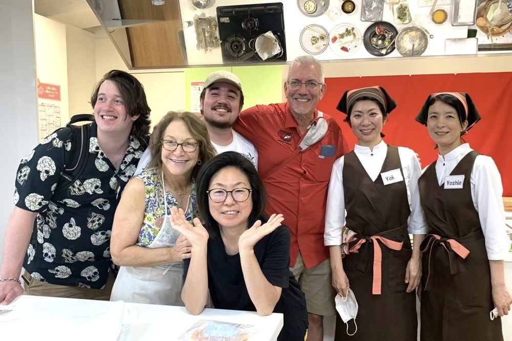 Traveler Emily Friedman and family at cooking class in Japan.