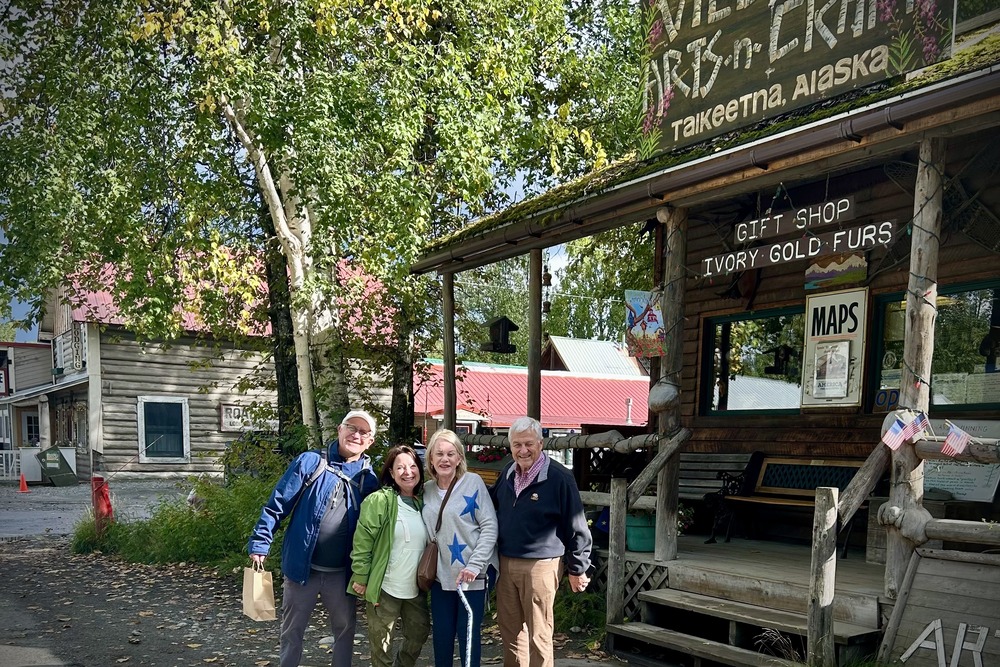 Kay and Max Reiboldt strolling in Talkeetna with friends.