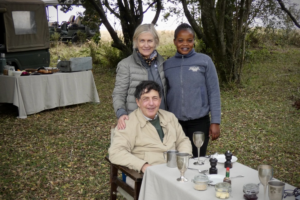 Nancy Rieger dining outside at Mara Expedition Camp in Kenya.