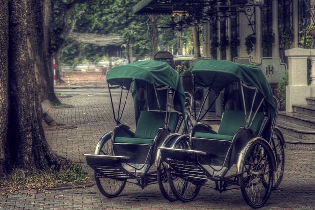 Cyclo outside the Sofitel Legend Metropole, Hanoi.