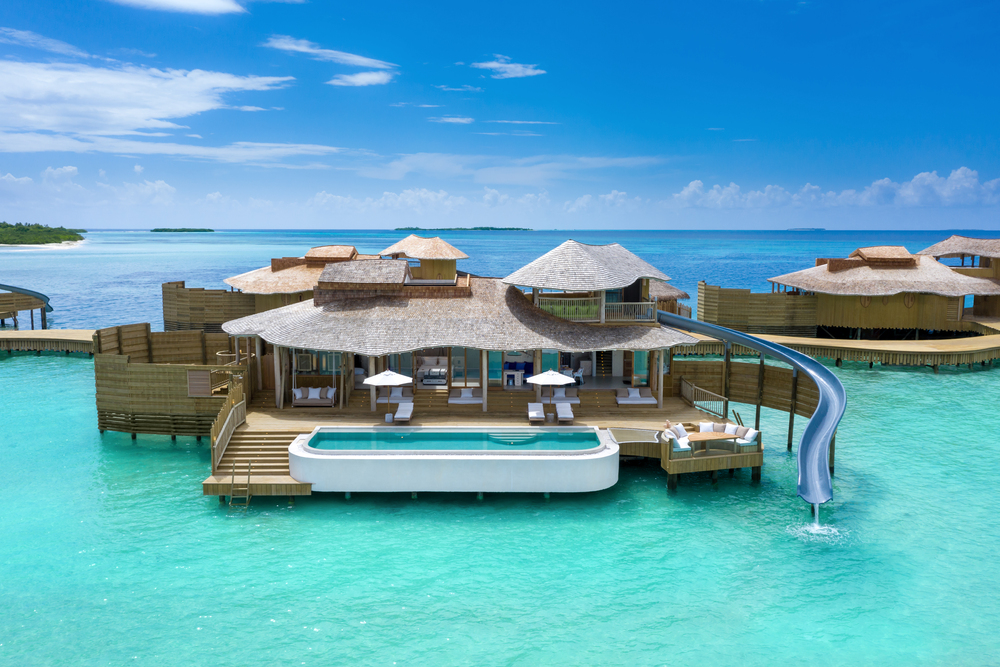 Overwater one bedroom villa with water slide, Soneva Jani, Maldives.