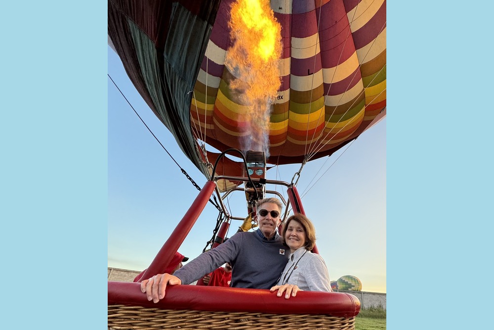 Catherine Mathis and husband on a hot air balloon trip over the ancient ruins of Teotihuacan in Mexico.