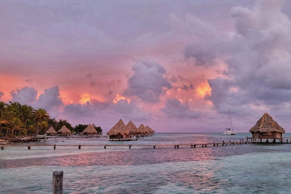 Sunset at Glovers Atoll Resort in Northeast Caye, Belize.