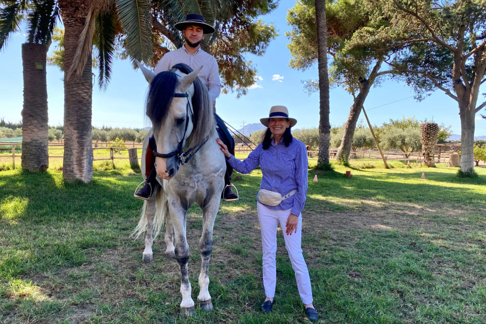 Kitty Bean Yancey and an Andalusian horse during at a breeding stable in Cartagena, Spain.