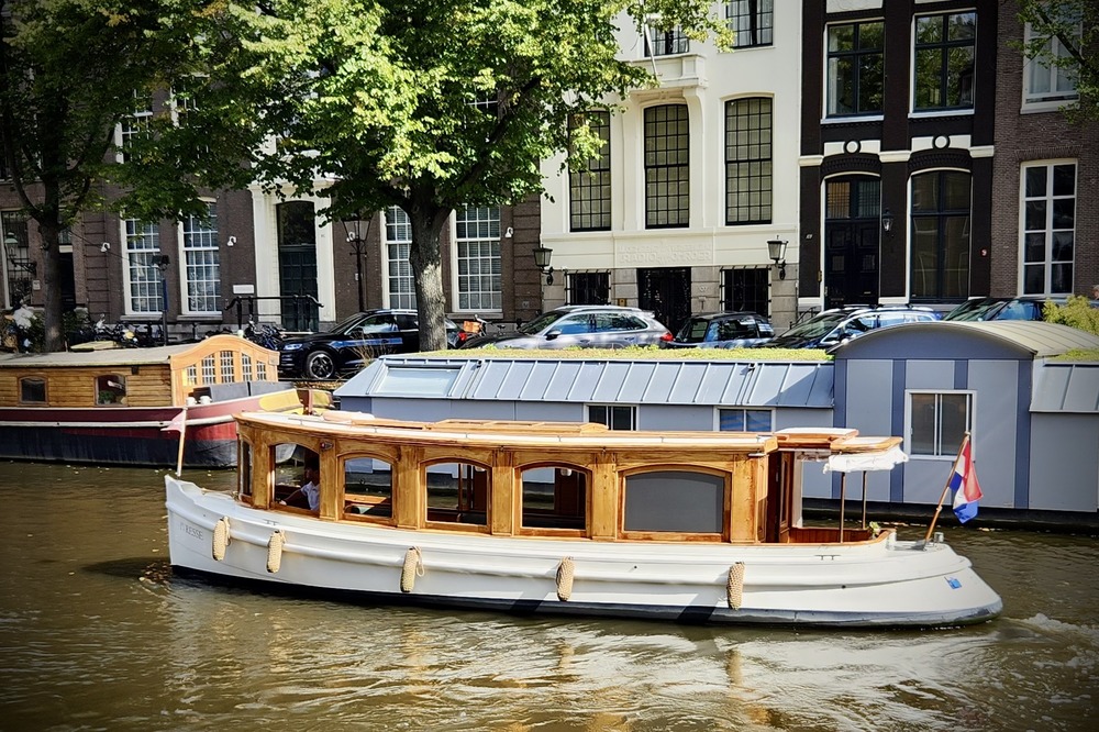 Private boat on the Amsterdam canal.