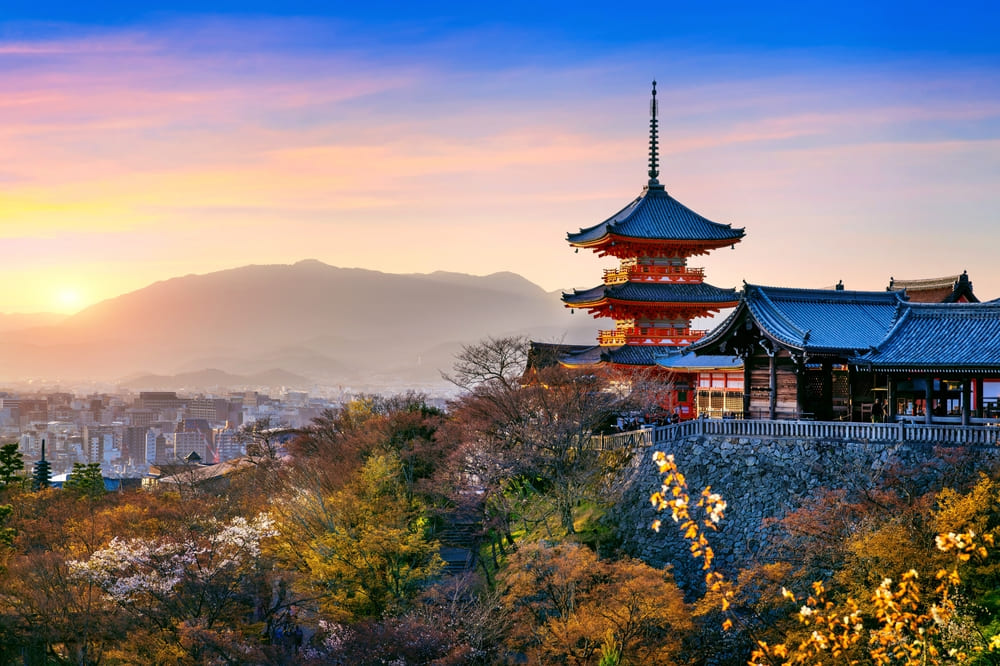 View of Kiyomizu temple at sunset in Kyoto, Japan.