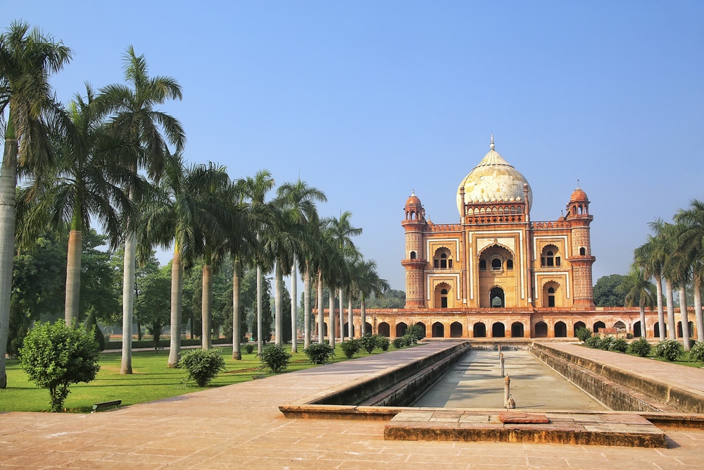 The Tomb of Safdarjung surrounded by palm trees in New Delhi, India.