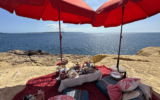 Picnic on the beach on Gozo Island, Malta.