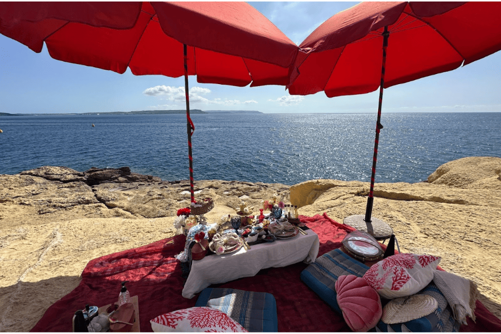 Picnic on the beach on Gozo Island, Malta.