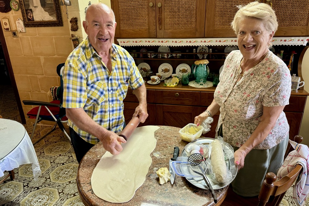 Pastizzi makers Gulinu and Nancy Scicluna ccoking.