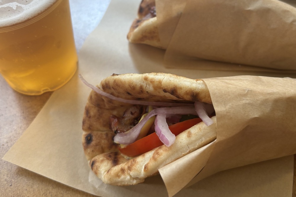 Souvlaki and a beer in the Athens Central Food market.