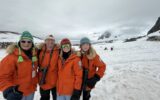 Susan Crandell, Brook Wilkinson and family on Cuverville Island in Antarctica.