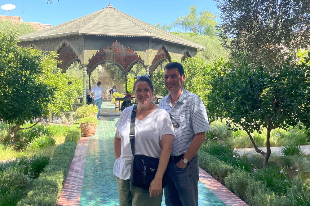 Aimee and her husband Seth in the Jardin Majorelle in Marrakesh.