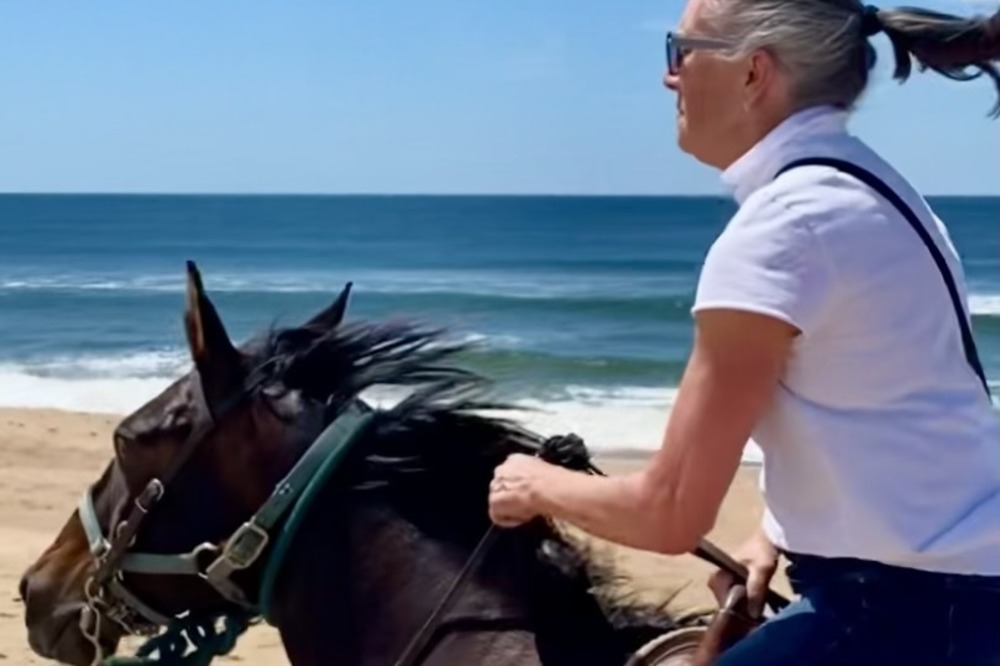 Jeannie Mullen riding a horse on the beach in Jose Ignacio.