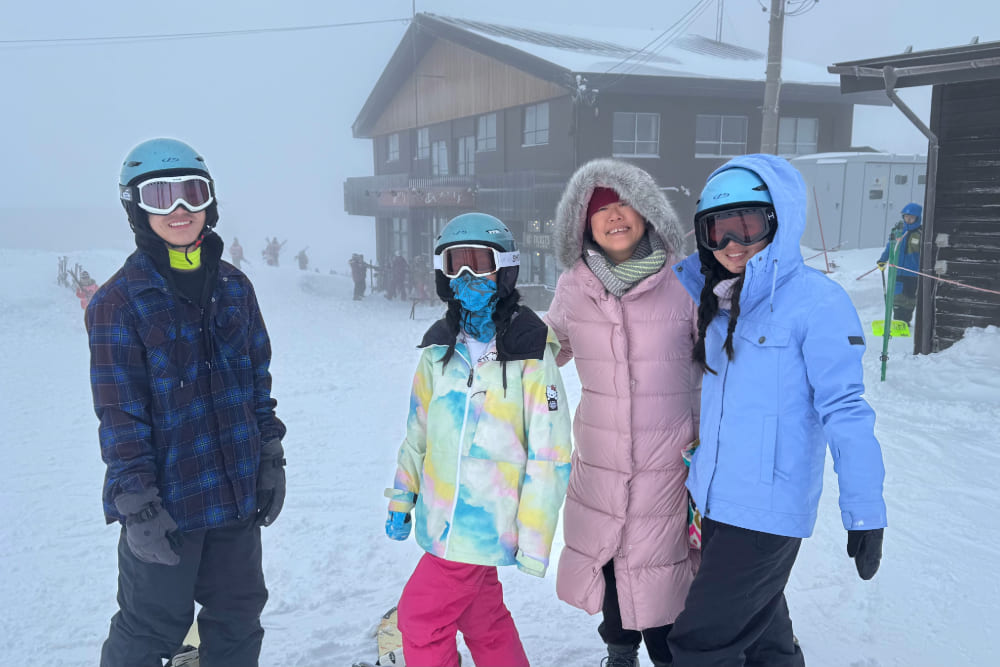 Jennifer Cheng and family snowboarding in Japan.