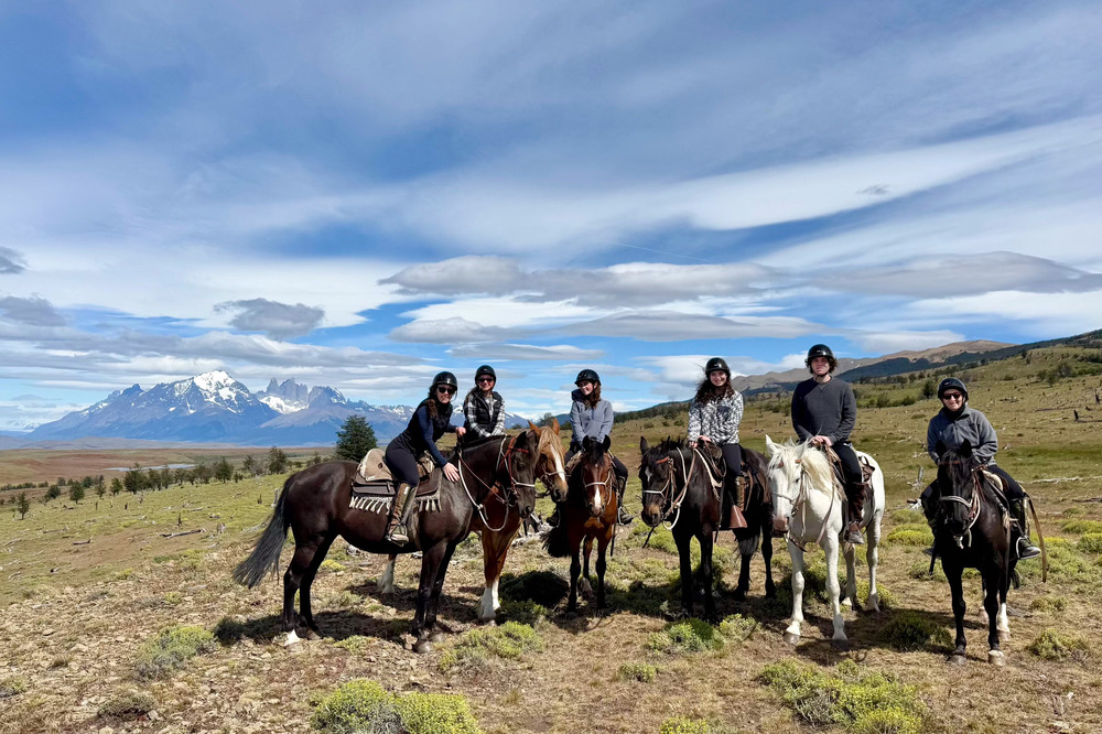 Lauren Schor and family horseback riding in Cerra Guido ranch in Patagonia.