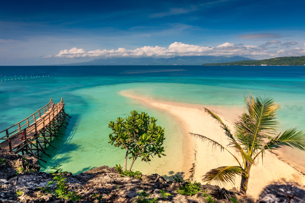 The Sand Bar and clear water beach at Sumilon Island, Cebu, Philippines.