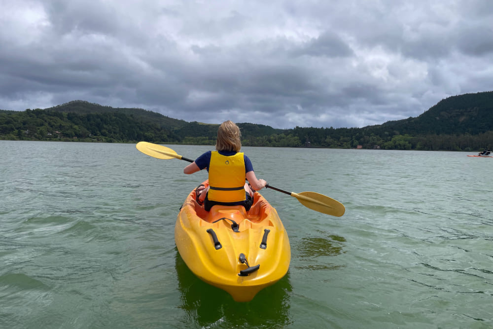 Brook Wilkinson kayaking in Lagoa do Furnas, Sao Miguel, Azores.