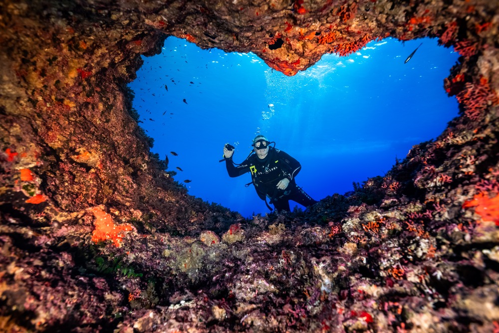 Timothy Baker scuba diving in Gozo, Malta.