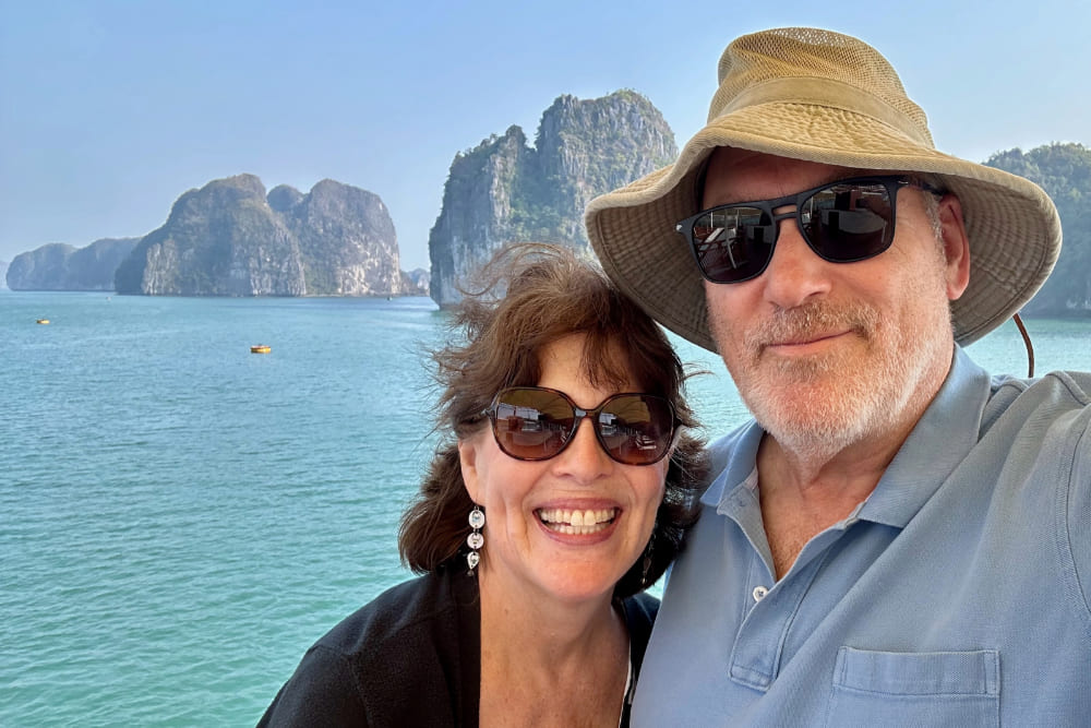 Barbara and David taking a selfie on a Halong Bay cruise.