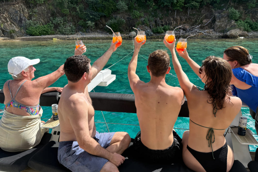 Meghan Schubert and family having cocktails on a yacht in the British Virgin Islands.