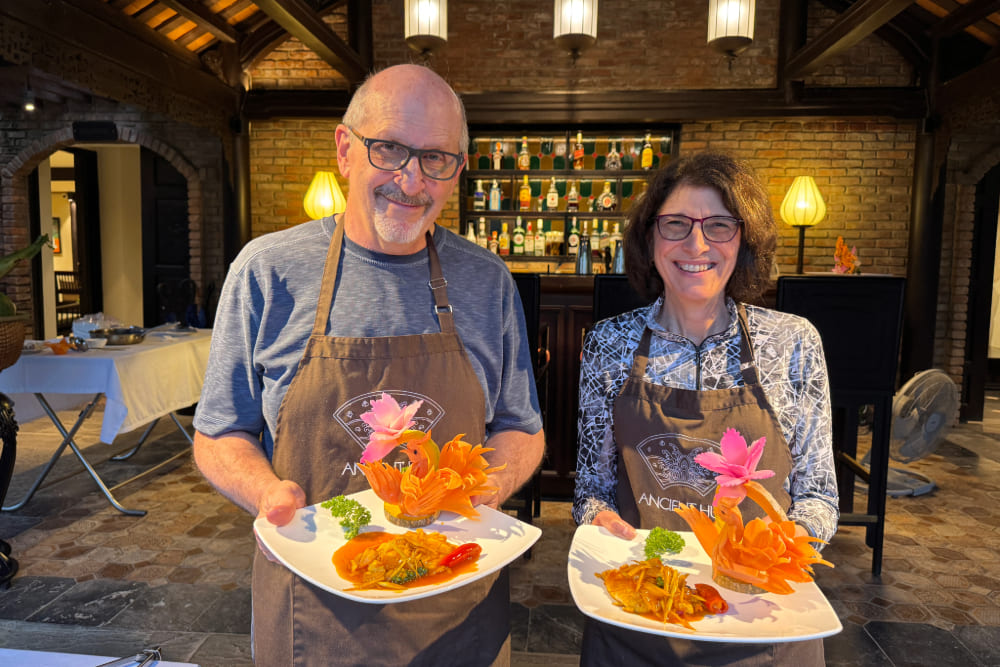 Carol Zuckerman and Barry Goldstein at a private cooking class in Vietnam.